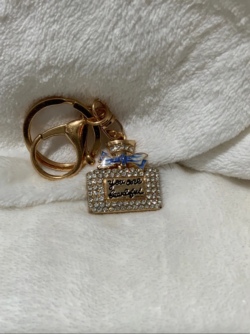 Gold-tone Crystal Perfume Bottle Keychain with Blue Bow